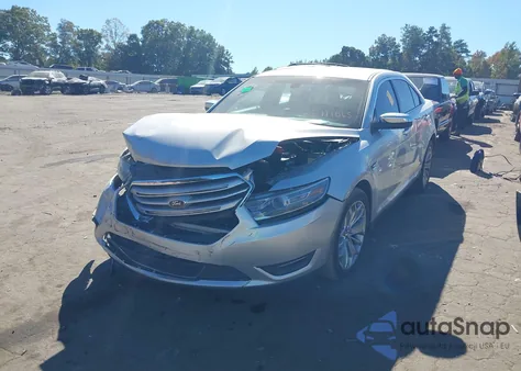 2014 Ford Taurus Limited z USA, uszkodzony, nr VIN 1FAHP2F86EG111065